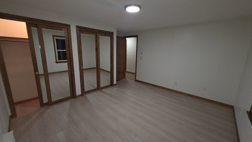 13 East Brookfield Road North Brookfield, MA 01535 - Photo 12 of 28 a view of an empty room with a window