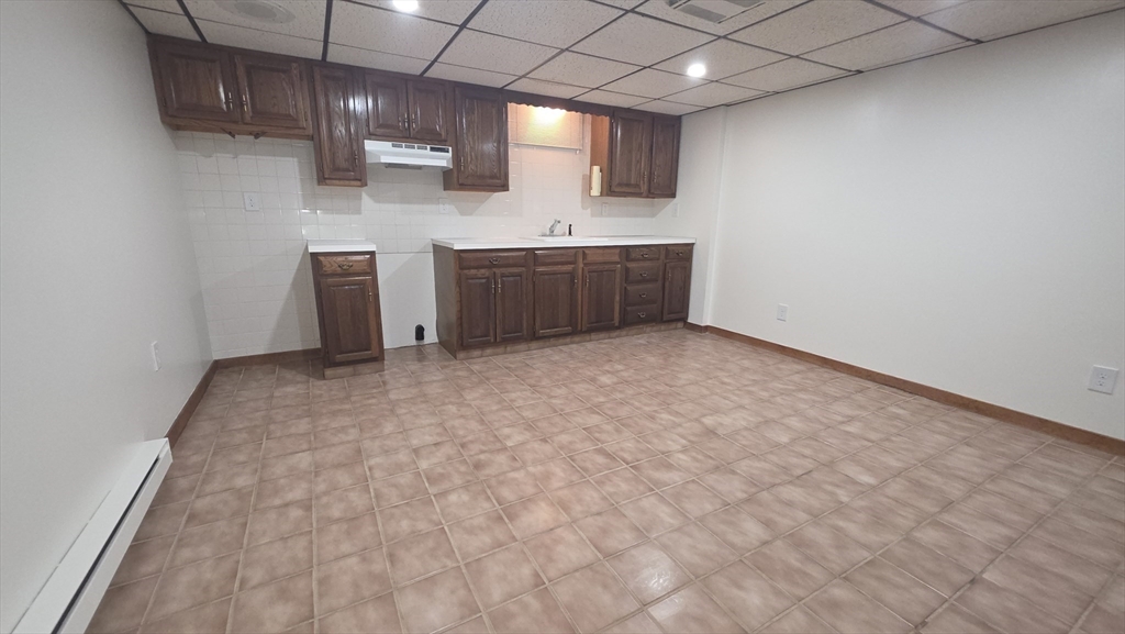 13 East Brookfield Road North Brookfield, MA 01535 - Photo 18 of 28 a view of a kitchen with wooden floor