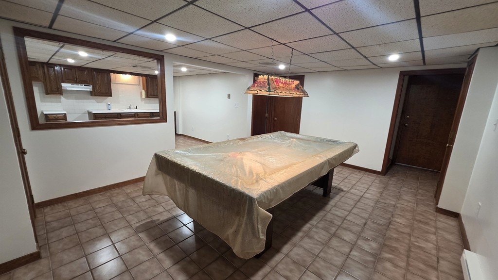 13 East Brookfield Road North Brookfield, MA 01535 - Photo 22 of 28 a kitchen with stainless steel appliances kitchen island granite countertop a refrigerator and a stove