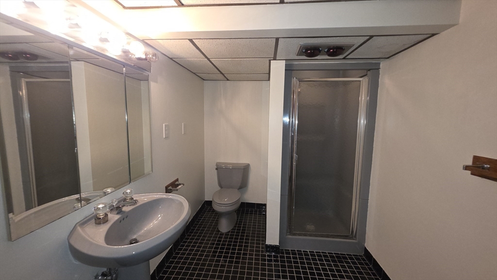 13 East Brookfield Road North Brookfield, MA 01535 - Photo 24 of 28 a bathroom with a sink toilet and shower