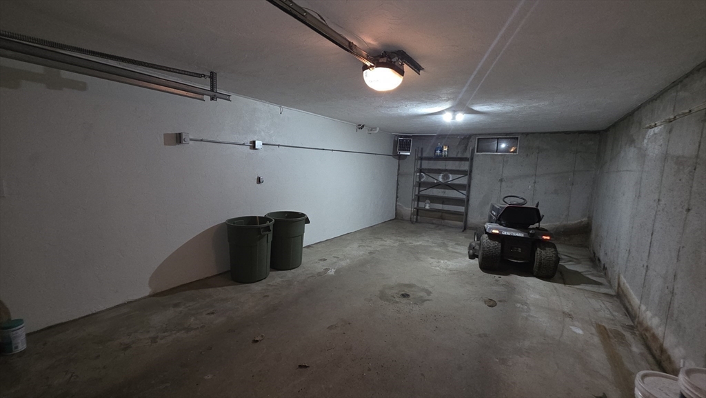 13 East Brookfield Road North Brookfield, MA 01535 - Photo 26 of 28 a living room with furniture and a chandelier