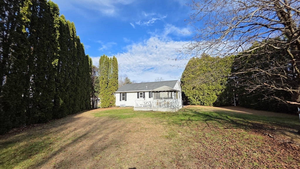 13 East Brookfield Road North Brookfield, MA 01535 - Photo 5 of 28 a view of swimming pool with an outdoor space and seating area
