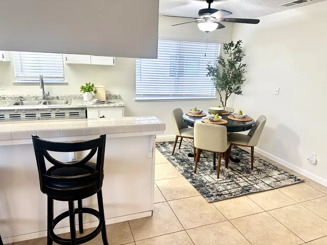 a bed room with a bed and furniture