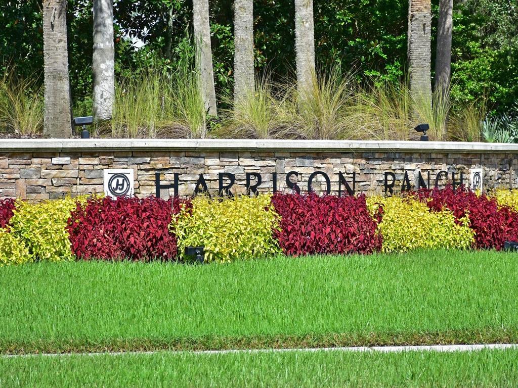9716 58th Street East Parrish, FL 34219 - Photo 34 of 58 a view of front of a house with a lots of flower garden