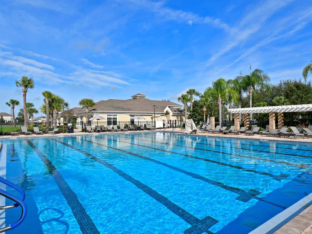 9716 58th Street East Parrish, FL 34219 - Photo 38 of 58 a view of swimming pool with outdoor seating