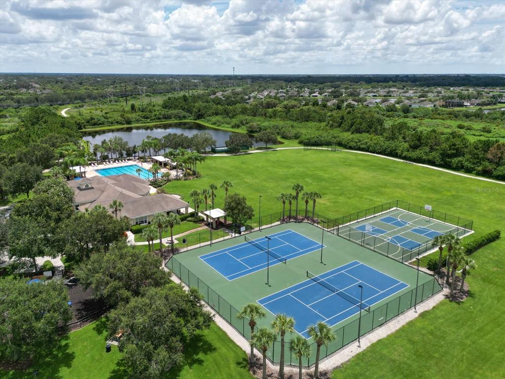 9716 58th Street East Parrish, FL 34219 - Photo 48 of 58 an aerial view of a house with a garden