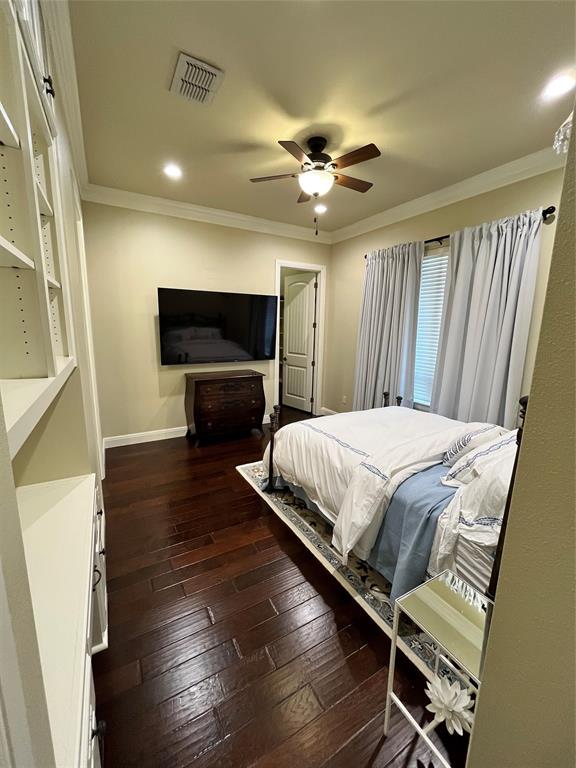 1255 County Road 3400 Emory, TX 75440 - Photo 10 of 36 a bedroom with a bed and a flat screen tv