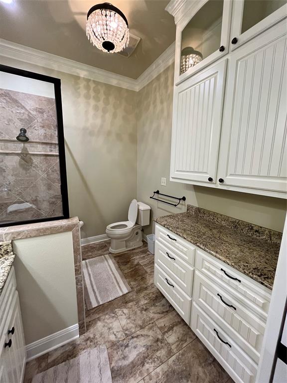 1255 County Road 3400 Emory, TX 75440 - Photo 12 of 36 a view of a bathroom with sink and a mirror