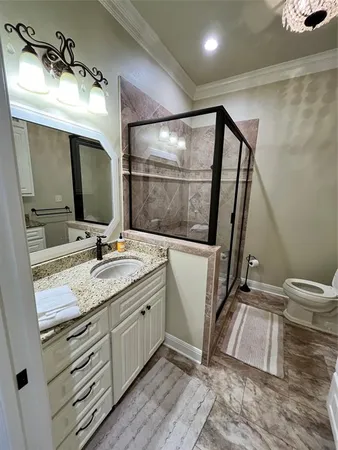a bathroom with a sink a mirror and a toilet