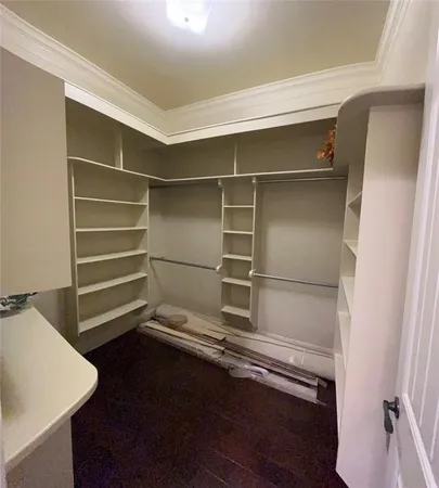 a storage room with wooden floor