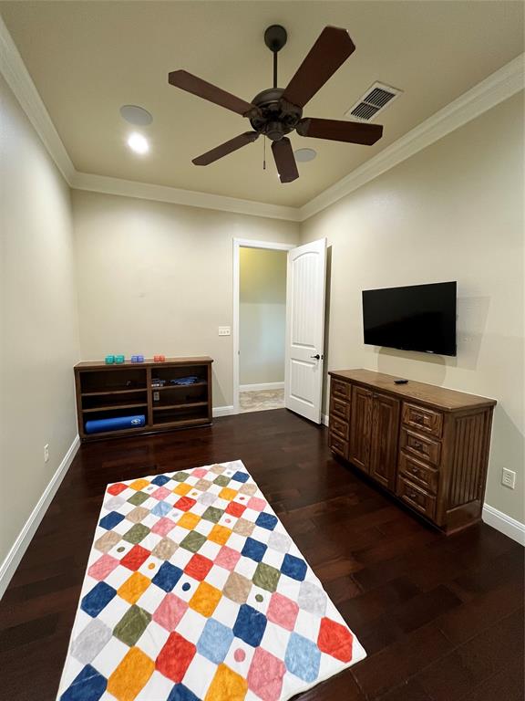 1255 County Road 3400 Emory, TX 75440 - Photo 18 of 36 a living room with furniture and a flat screen tv