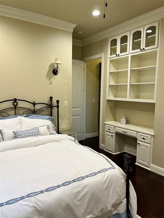 1255 County Road 3400 Emory, TX 75440 - Photo 19 of 36 a bedroom with a bed and a desk