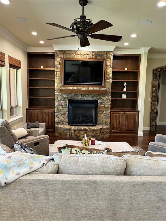 1255 County Road 3400 Emory, TX 75440 - Photo 21 of 36 a living room with fireplace furniture and a flat screen tv