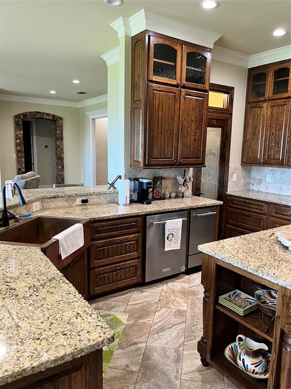1255 County Road 3400 Emory, TX 75440 - Photo 36 of 36 a kitchen with a sink stove and refrigerator