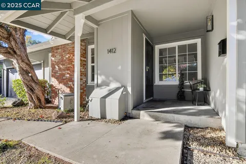 a house view with a outdoor space