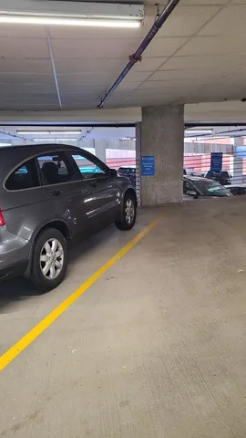 a black refrigerator freezer sitting inside of a kitchen