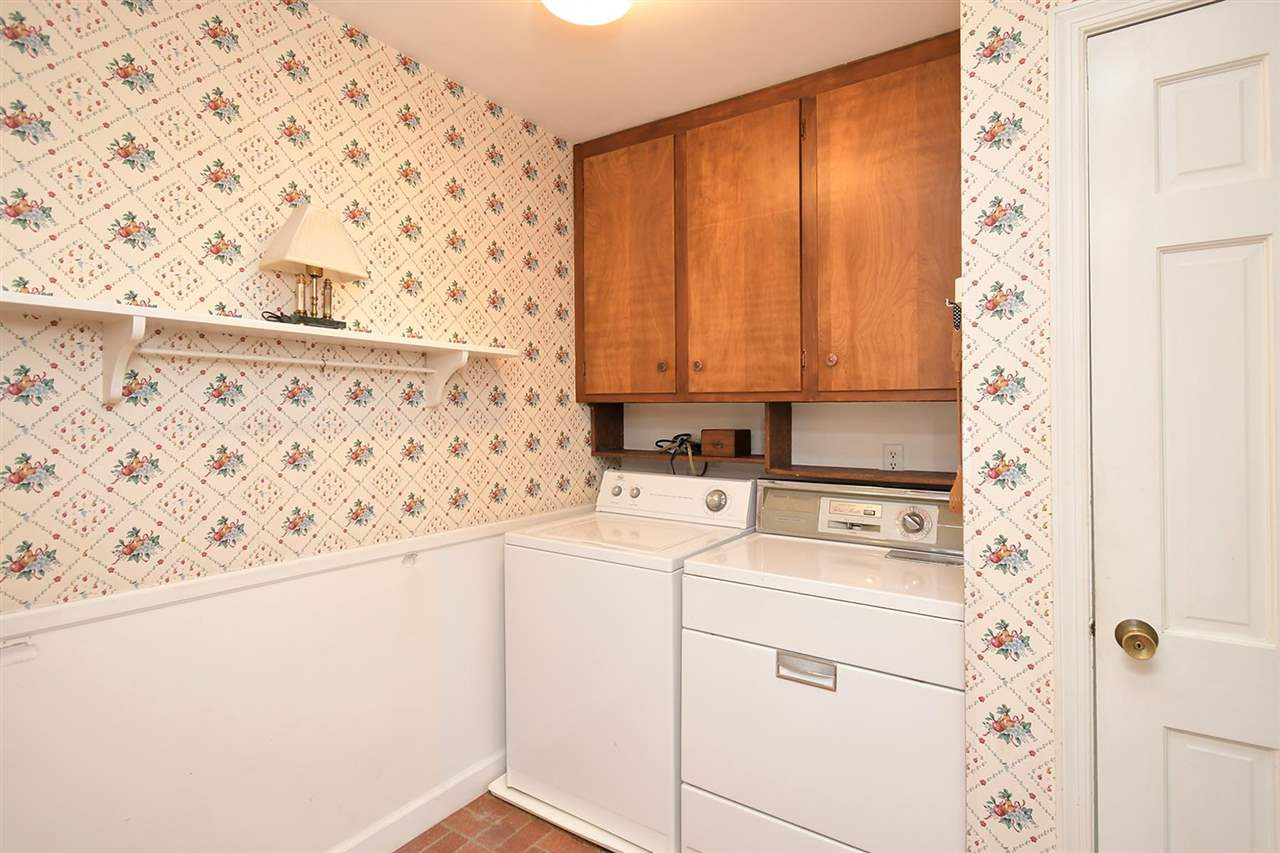 505 South Hollybrook Road Wendell, NC 27591 - Photo 11 of 24 Laundry room located off the kitchen also has an entrance and pantry. Laundry Room