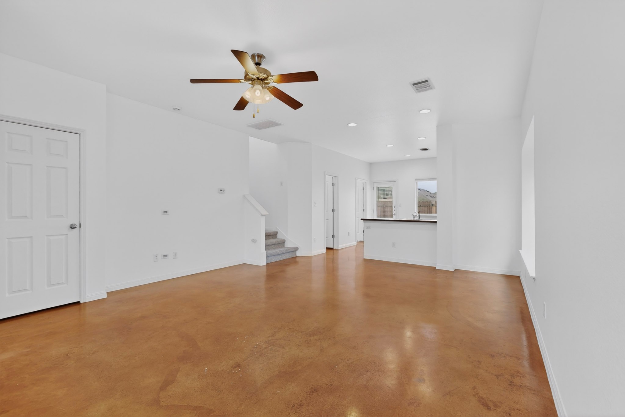 4619 Inicio Lane Austin, TX 78725 - Photo 6 of 32 an empty room with closet and windows