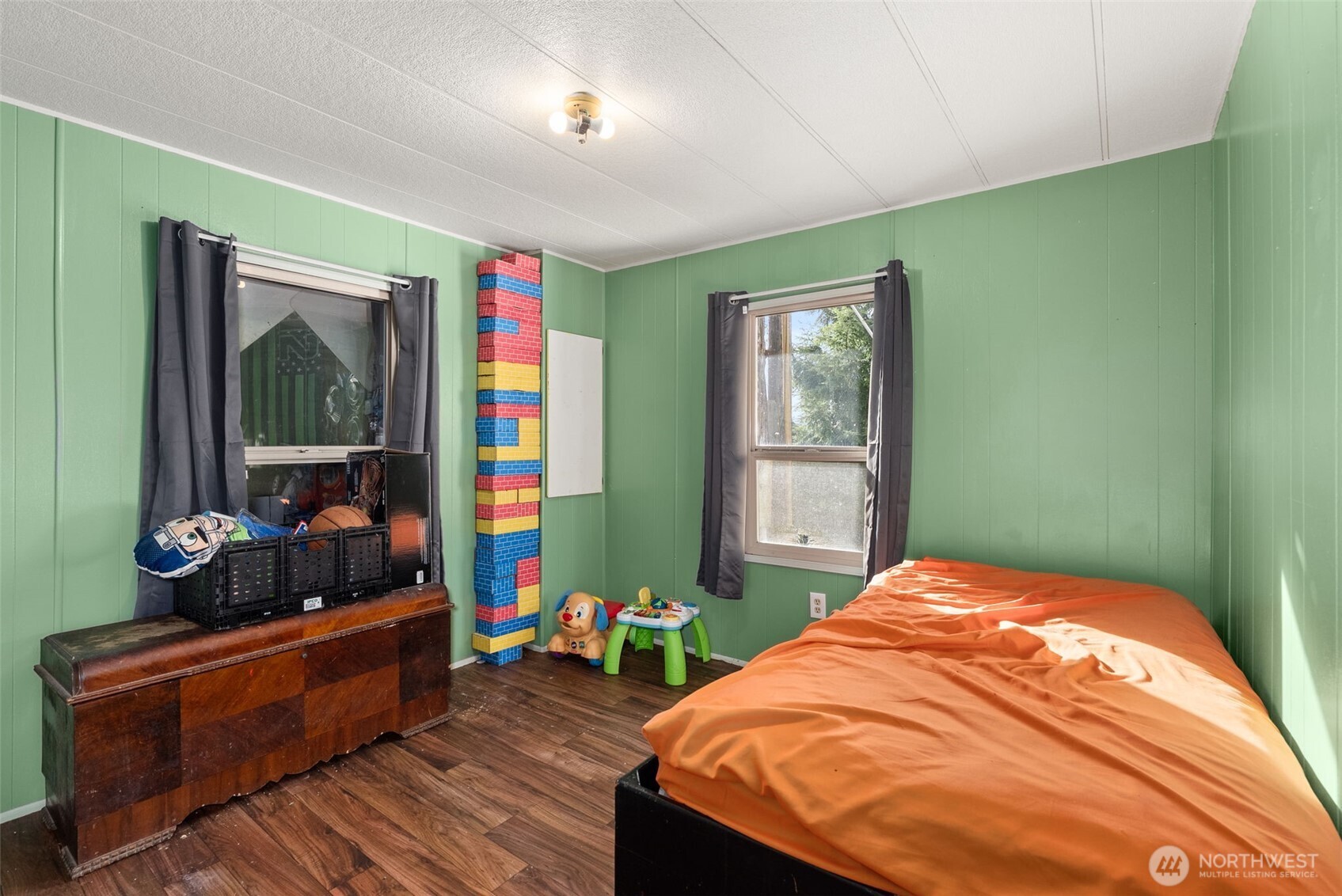 2700 Mallis Landing Road Raymond, WA 98577 - Photo 20 of 33 a bed room with a bed and a window