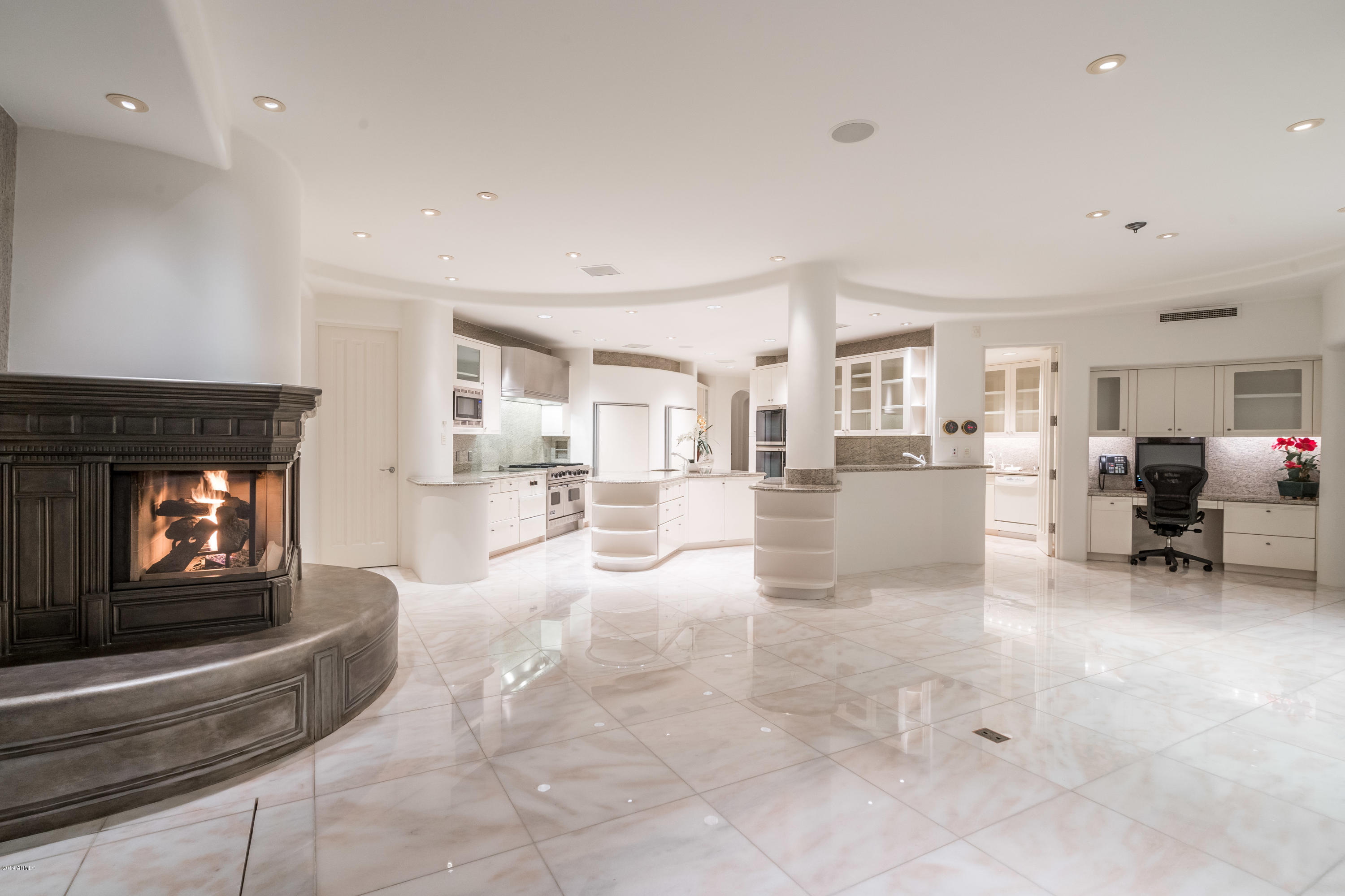 7011 North Invergordon Road Paradise Valley, AZ 85253 - Photo 13 of 38 Kitchen/Living/Gas Fireplace