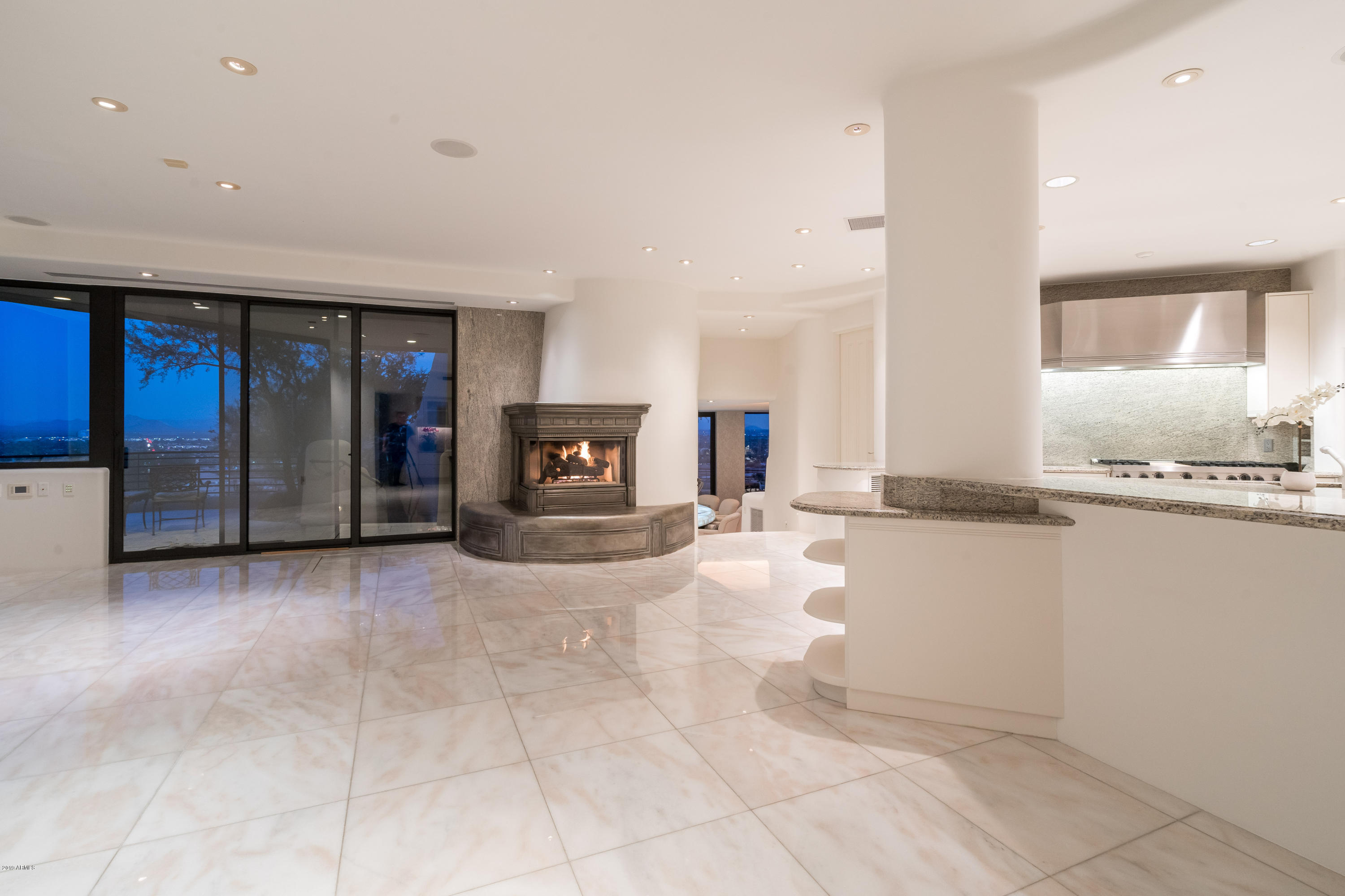 7011 North Invergordon Road Paradise Valley, AZ 85253 - Photo 14 of 38 Kitchen/Living/Gas Fireplace