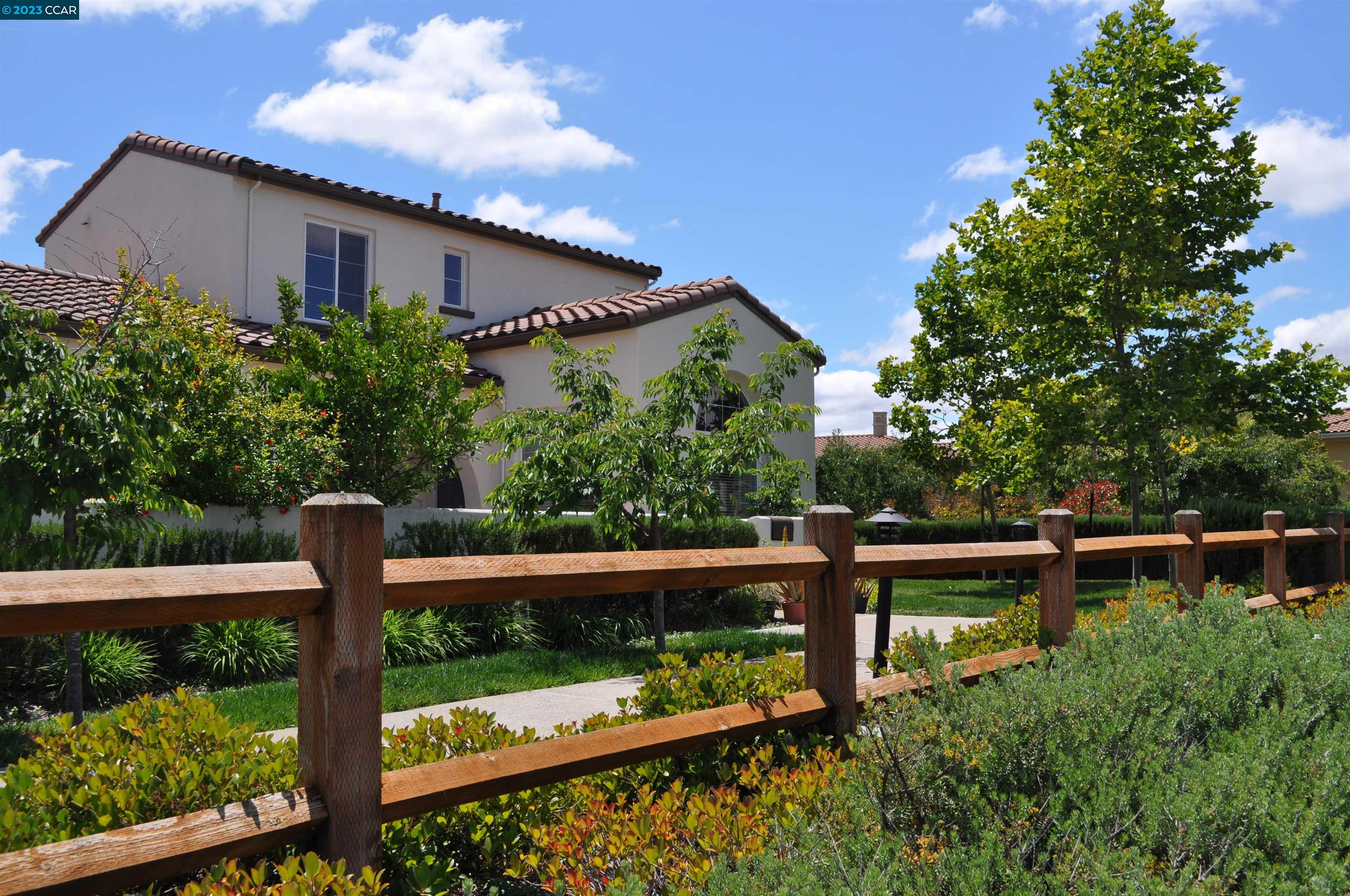 1016 Cedarwood Loop San Ramon, CA 94582 - Photo 1 of 8 a front view of a house with garden