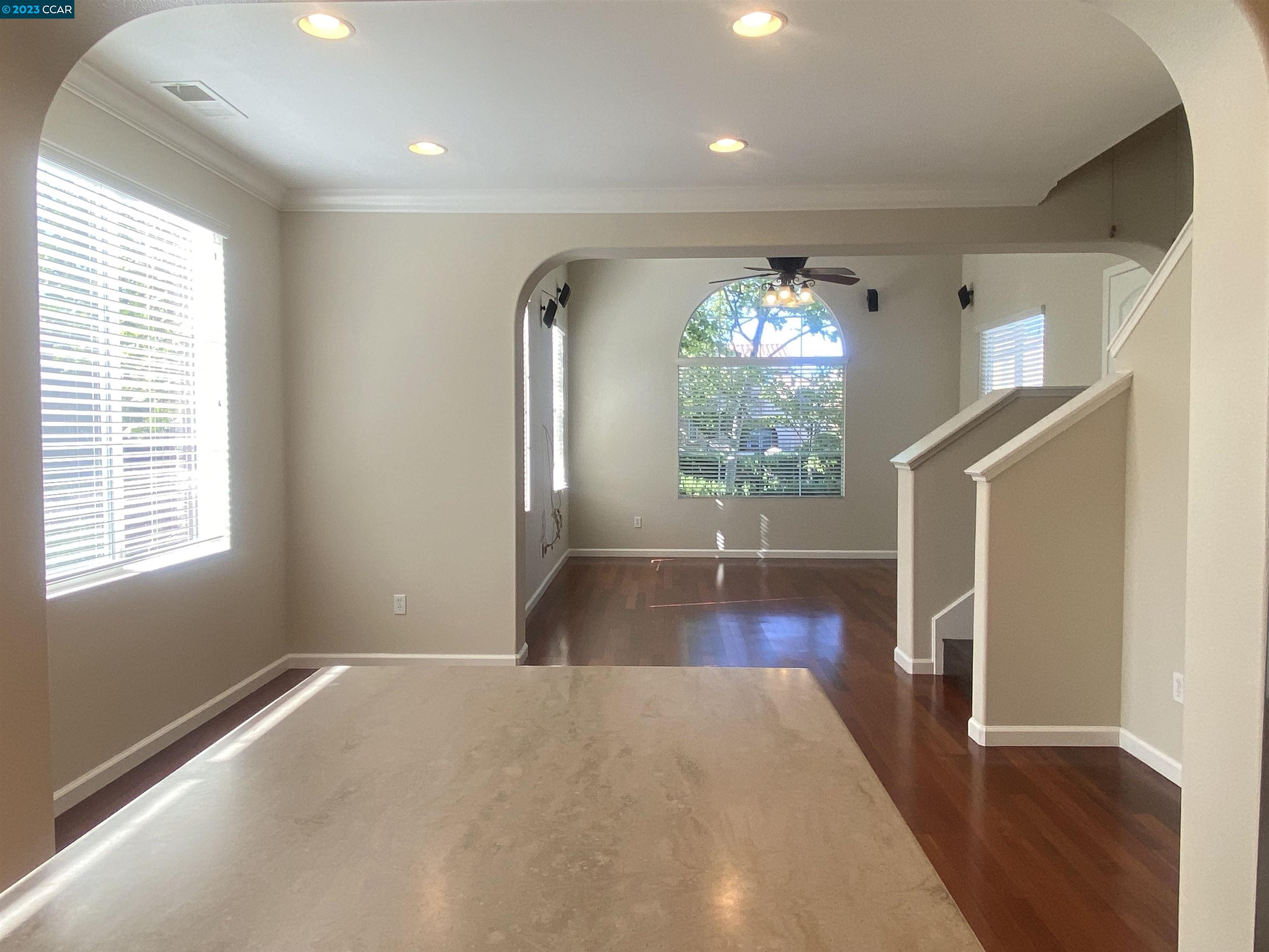 1016 Cedarwood Loop San Ramon, CA 94582 - Photo 4 of 8 a view of livingroom with hardwood floor and a ceiling fan