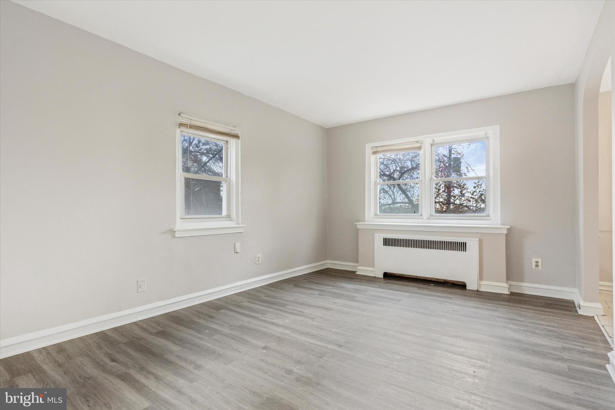 2415 80th Avenue Philadelphia, PA 19150 - Photo 15 of 35 a view of a bedroom with wooden floor and window