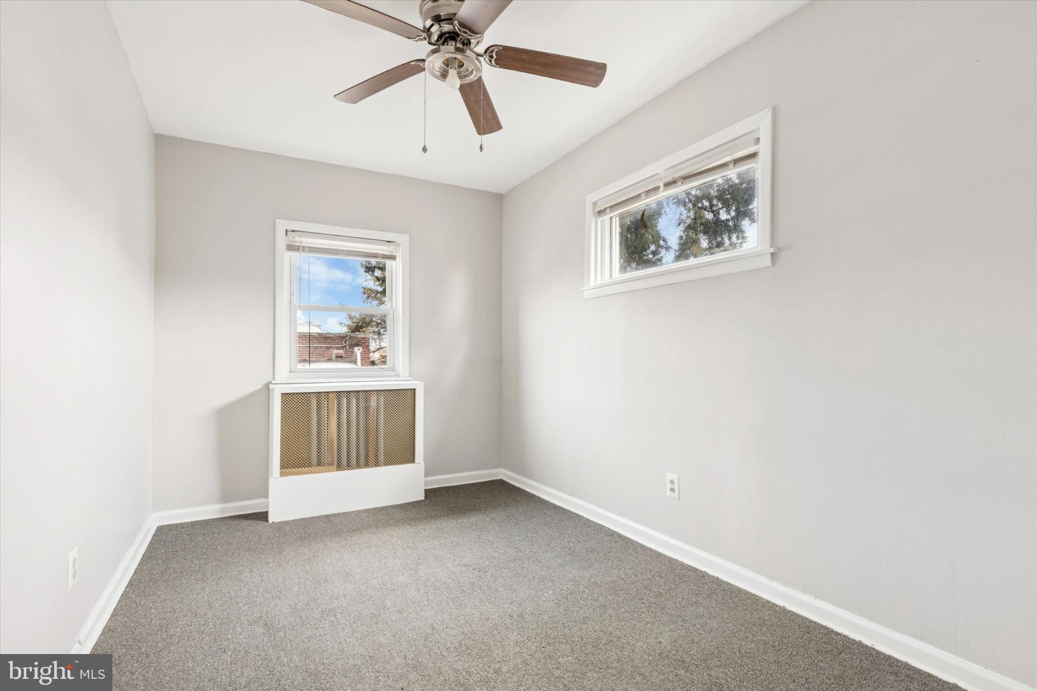 2415 80th Avenue Philadelphia, PA 19150 - Photo 24 of 35 a view of an empty room with a window