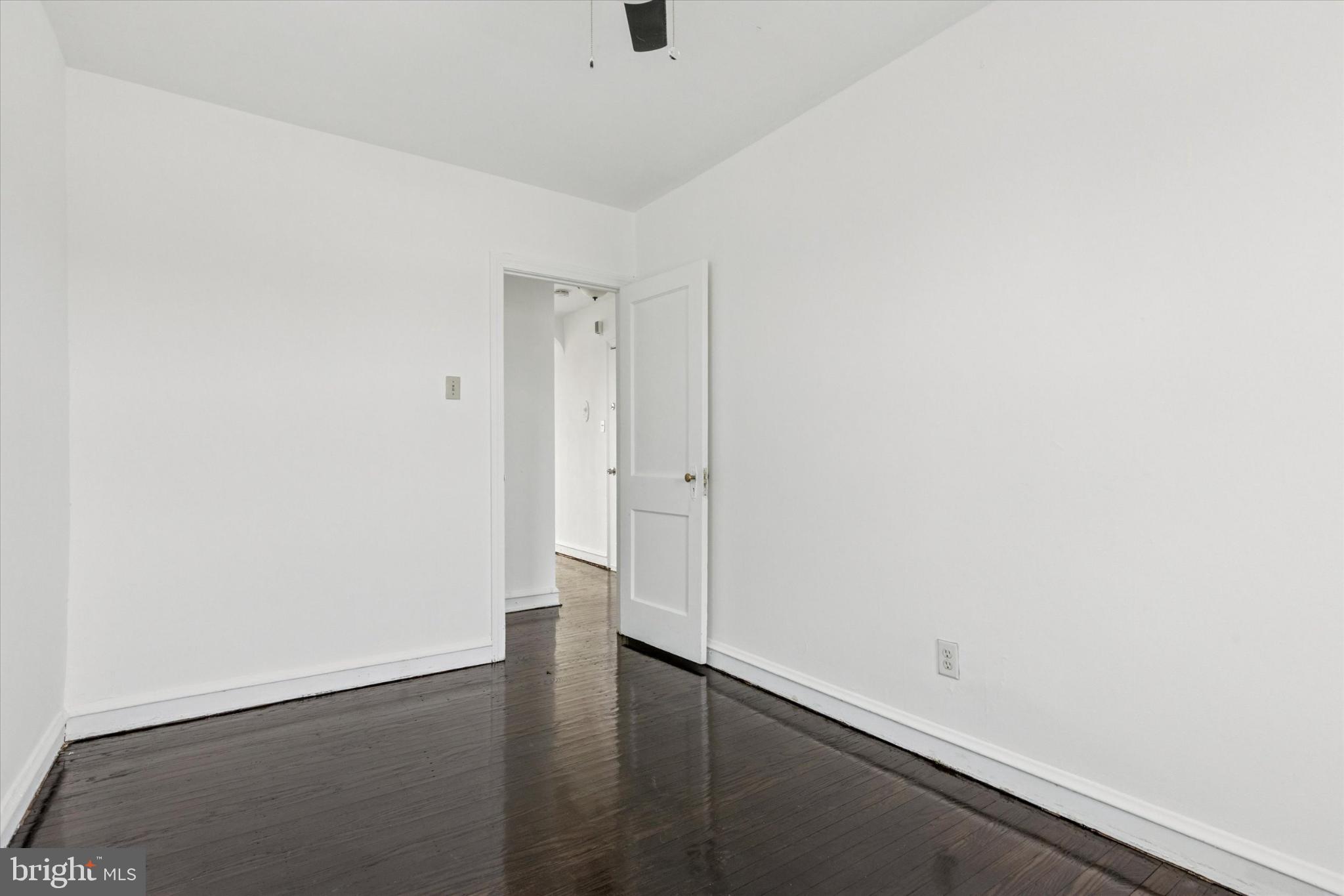 2415 80th Avenue Philadelphia, PA 19150 - Photo 29 of 35 an empty room with wooden floor
