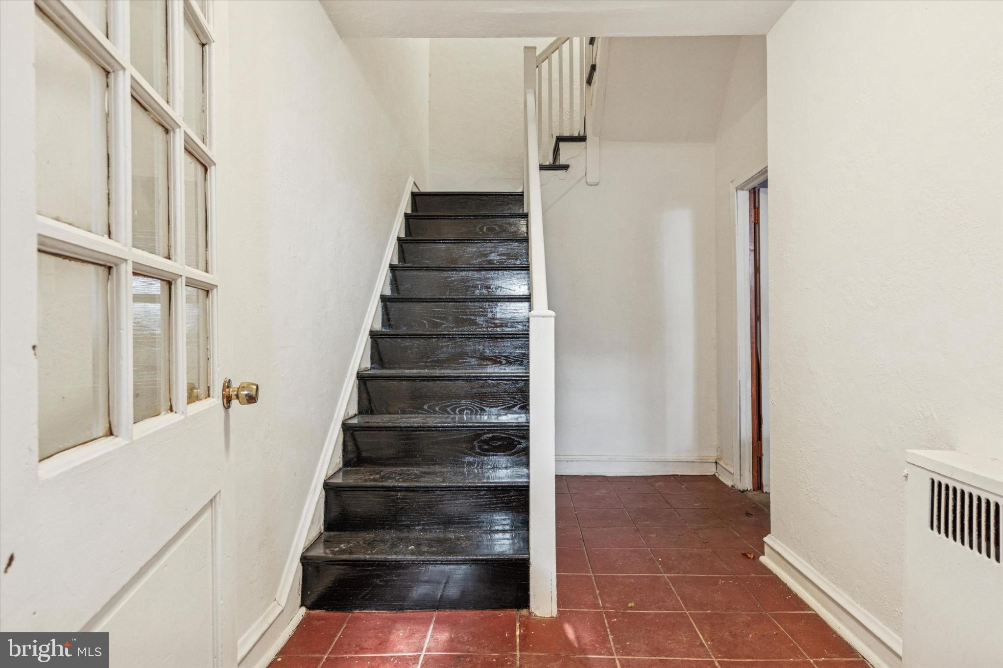 2415 80th Avenue Philadelphia, PA 19150 - Photo 35 of 35 a view of staircase with white walls and a window