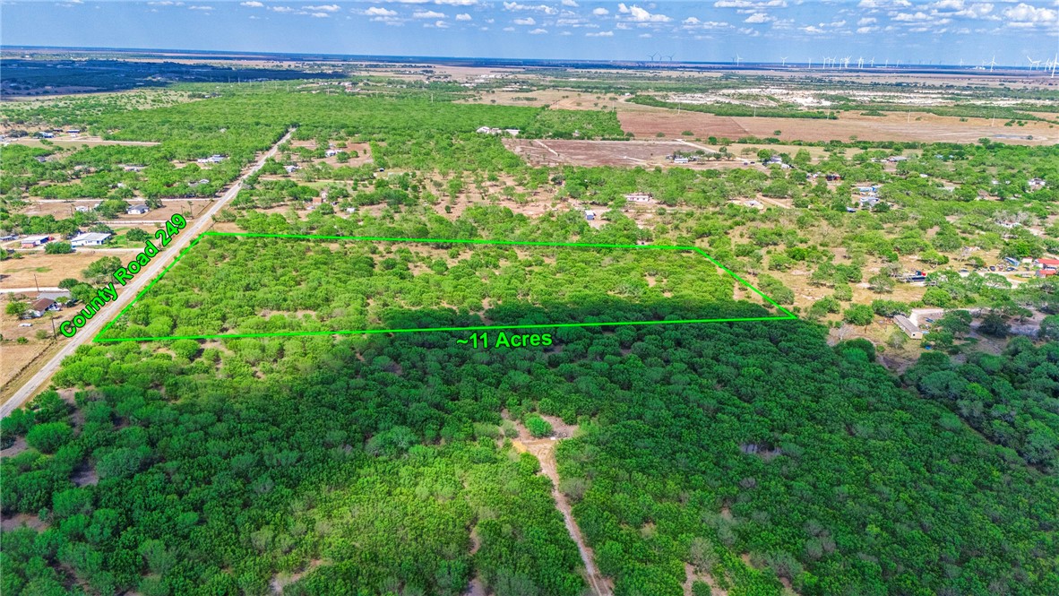 24940 County Road 249 Mathis, TX 78368 - Photo 8 of 14 a view of a large body of water with a yard