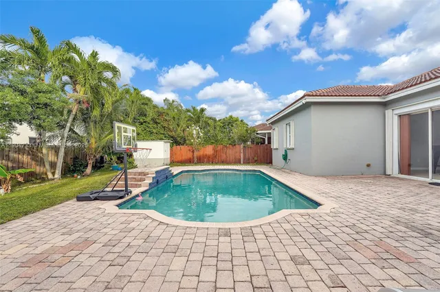 a view of outdoor space yard and swimming pool