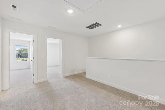 an empty room with an entryway