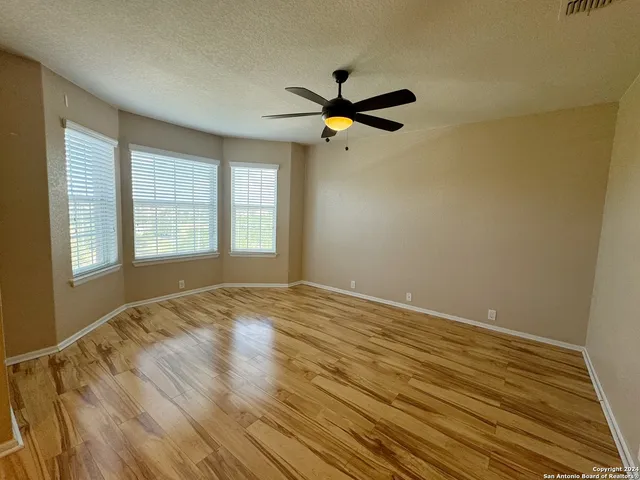 a view of an empty room and window