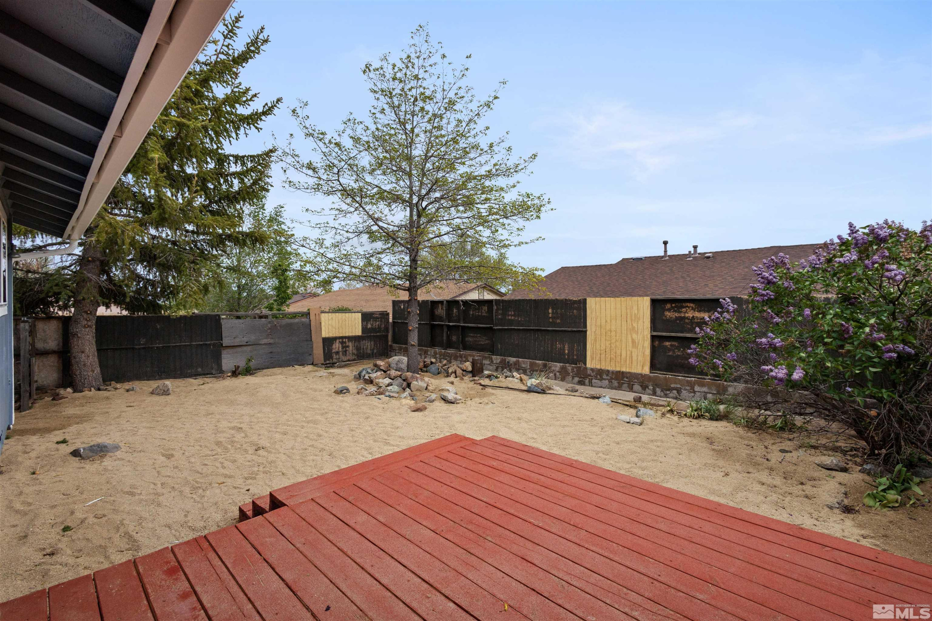 6798 Flower Street Reno, NV 89506 - Photo 20 of 22 a view of a house with a patio
