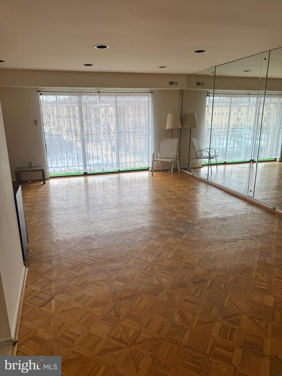 9908-00 Bustleton Avenue, Unit D2 Philadelphia, PA 19115 - Photo 4 of 11 a view of an empty room with a window