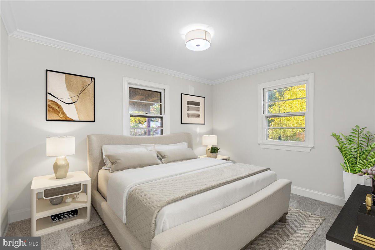 2004 Wolf Street Fort Washington, MD 20744 - Photo 21 of 39 a bedroom with a bed and a window