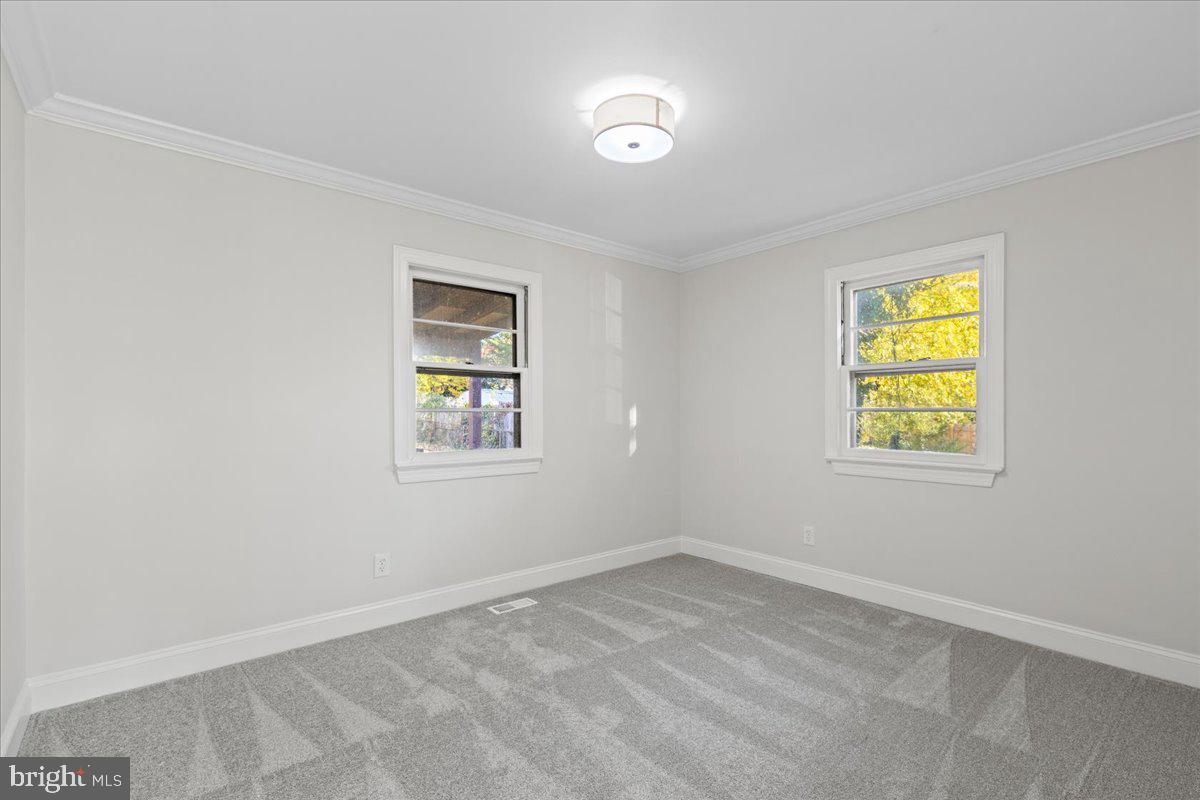 2004 Wolf Street Fort Washington, MD 20744 - Photo 22 of 39 a view of an empty room with a window