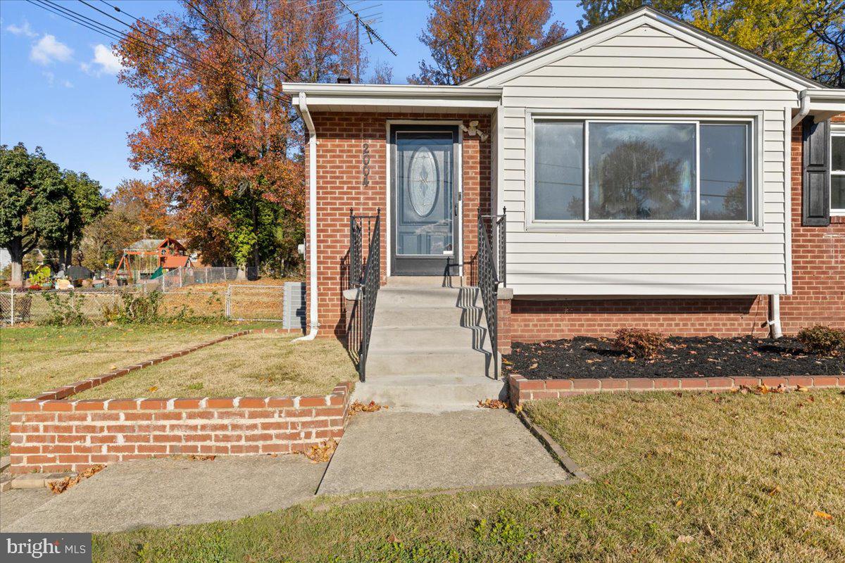 2004 Wolf Street Fort Washington, MD 20744 - Photo 5 of 39 a view of a house with wooden fence