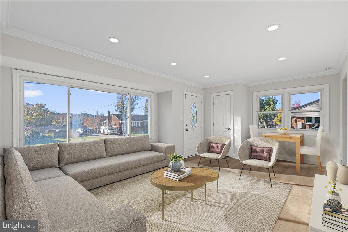 2004 Wolf Street Fort Washington, MD 20744 - Photo 9 of 39 a living room with furniture and a large window