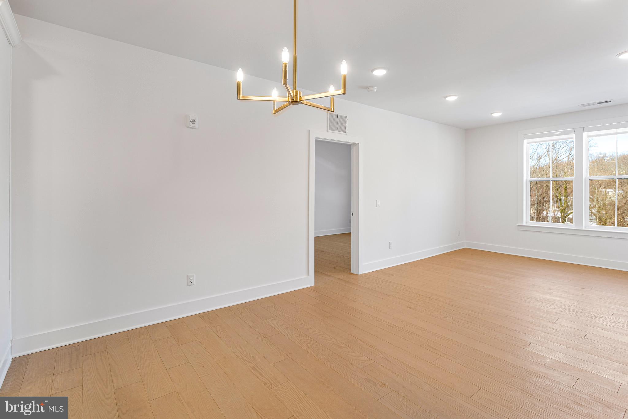 76 Old Mill Bottom Road North, Unit 205 Annapolis, MD 21409 - Photo 21 of 34 a view of an empty room with a window