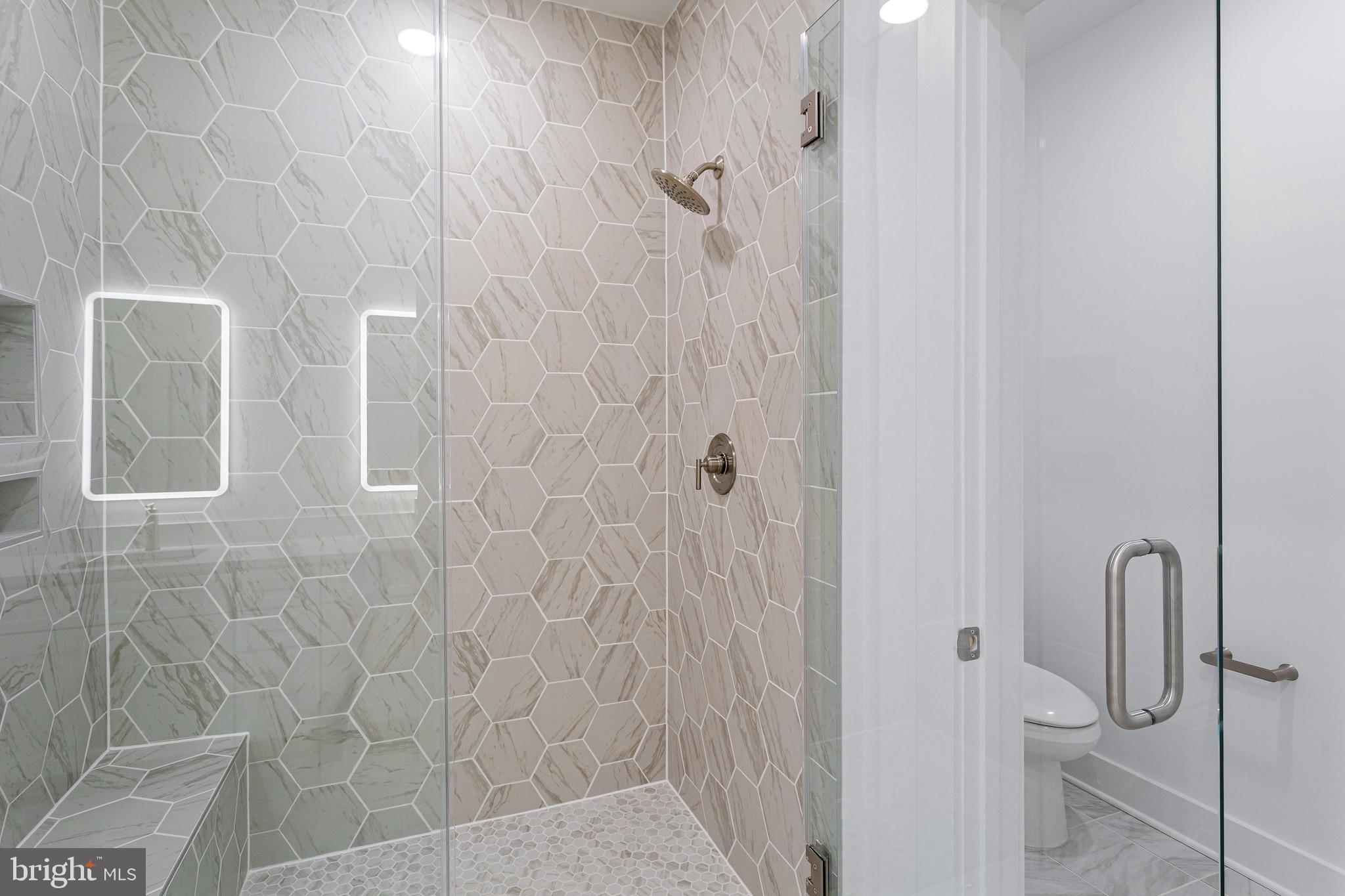 76 Old Mill Bottom Road North, Unit 205 Annapolis, MD 21409 - Photo 23 of 34 a bathroom with a shower