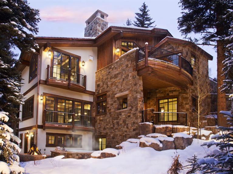 405 West Forest Road Vail, CO 81657 - Photo 13 of 22 a view of a building with a cars park side of a road