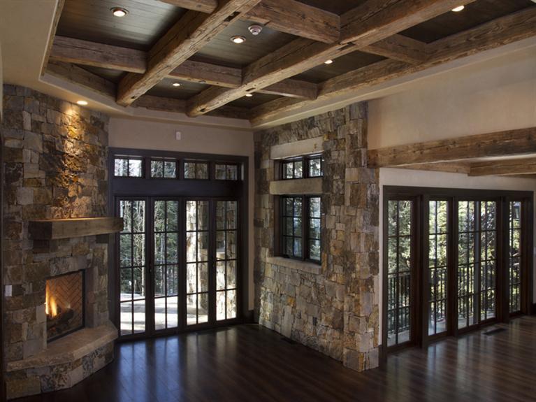 405 West Forest Road Vail, CO 81657 - Photo 14 of 22 a view of an empty room with wooden floor and a window