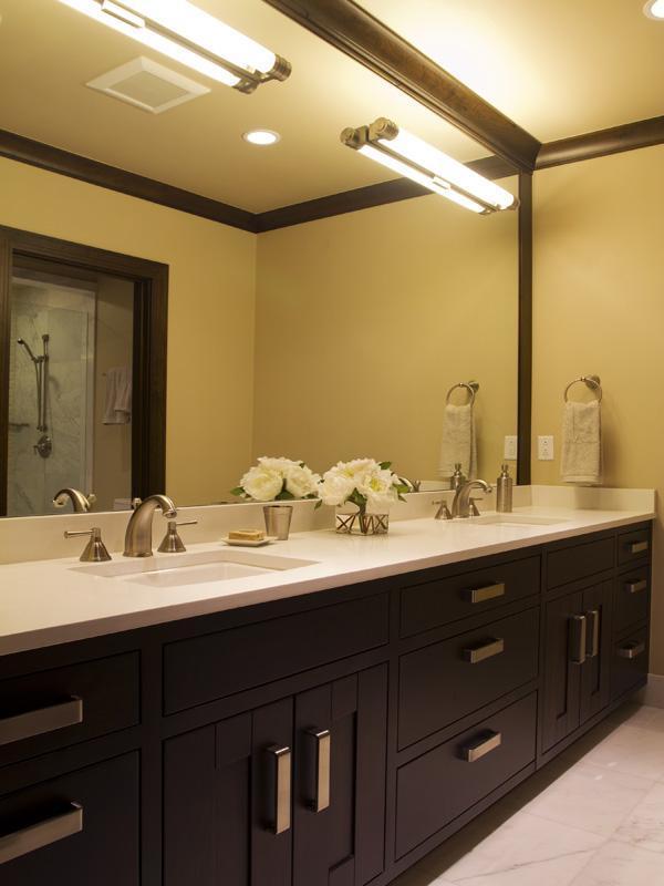 405 West Forest Road Vail, CO 81657 - Photo 18 of 22 a bathroom with a double vanity sink and mirror