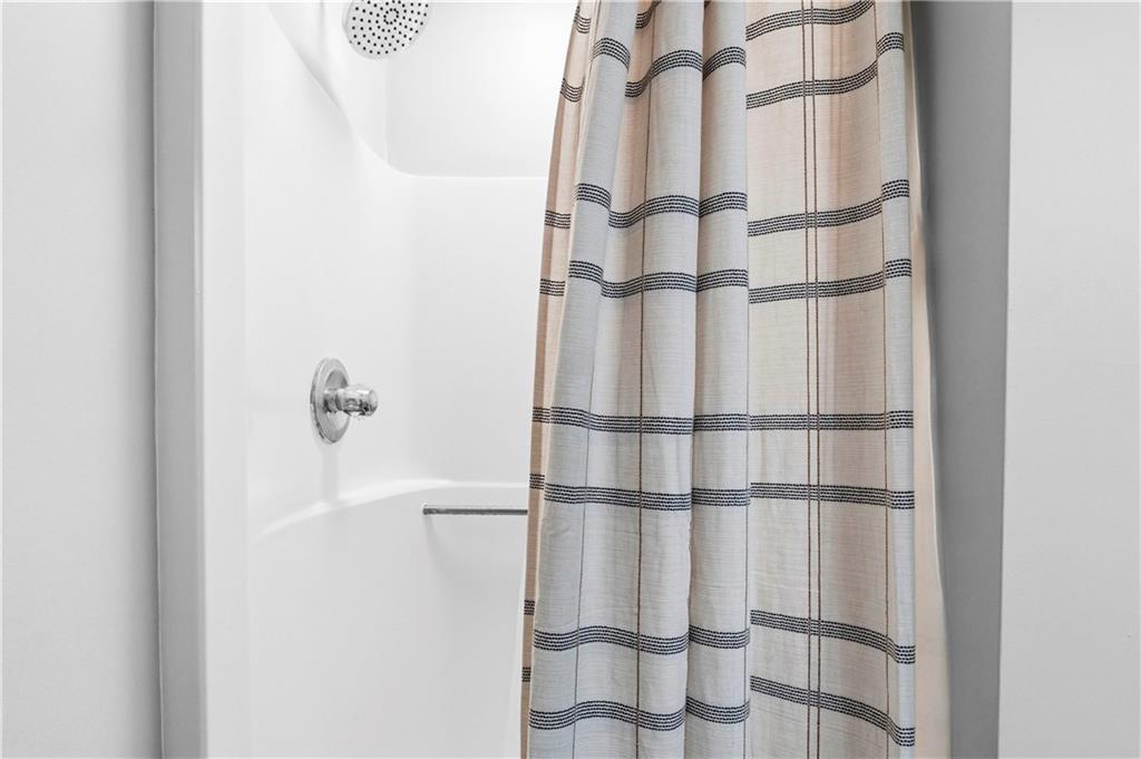 2777 Chickadee Drive Monroe, GA 30655 - Photo 16 of 36 a bathroom with a shower