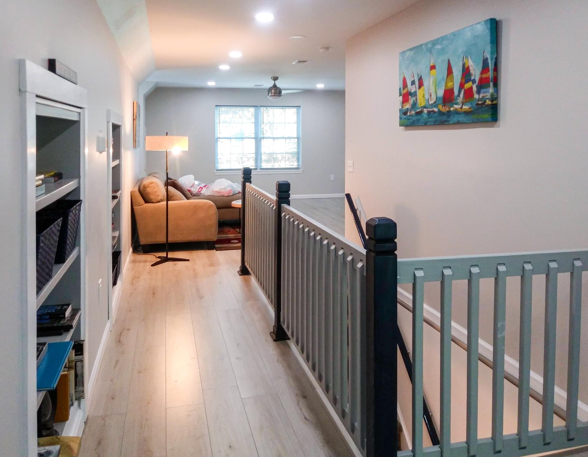 18 Cedarbrook Road Cape May, NJ 08204 - Photo 19 of 44 a living room with furniture and a painting on the wall