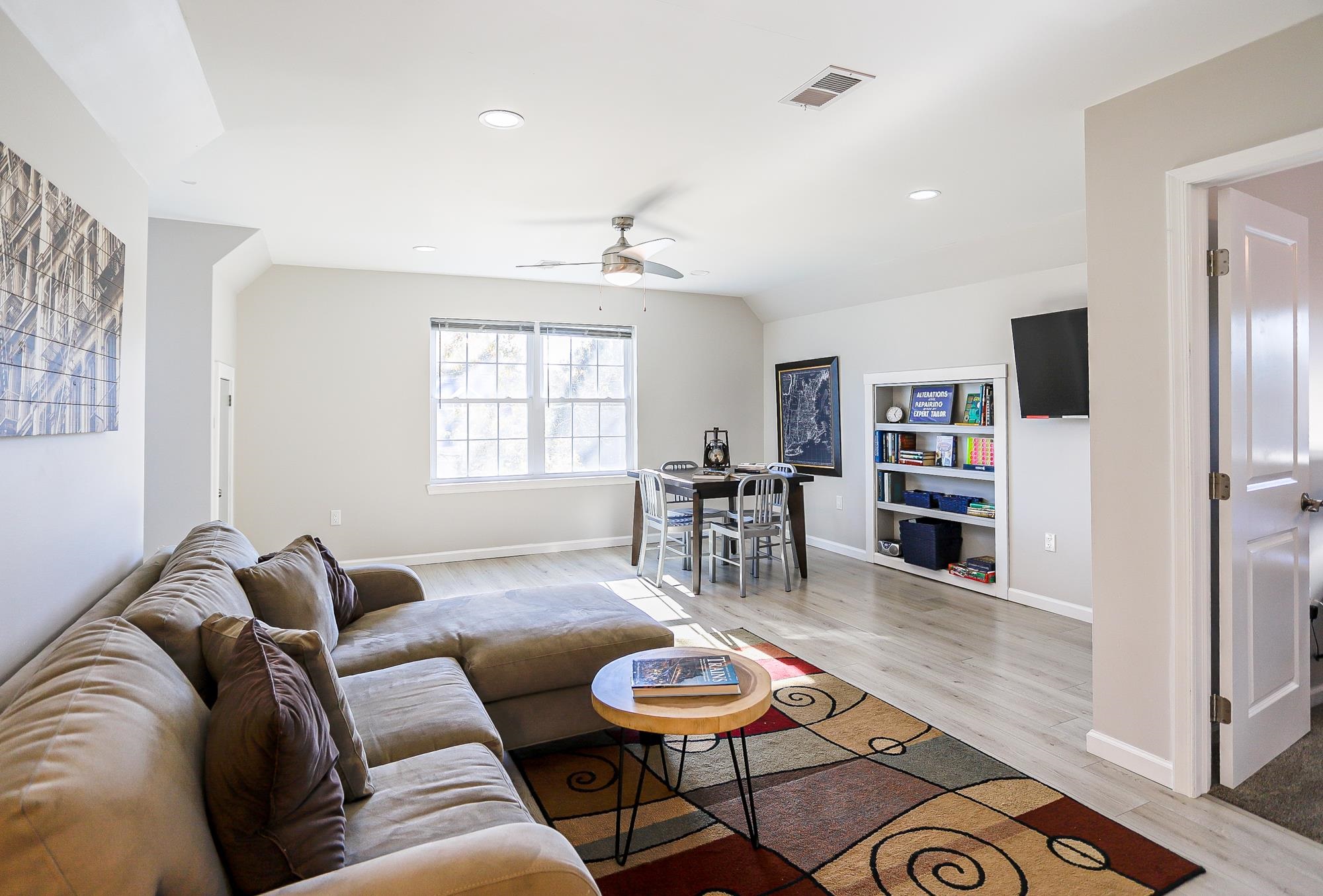 18 Cedarbrook Road Cape May, NJ 08204 - Photo 20 of 44 a living room with furniture and a wooden floor