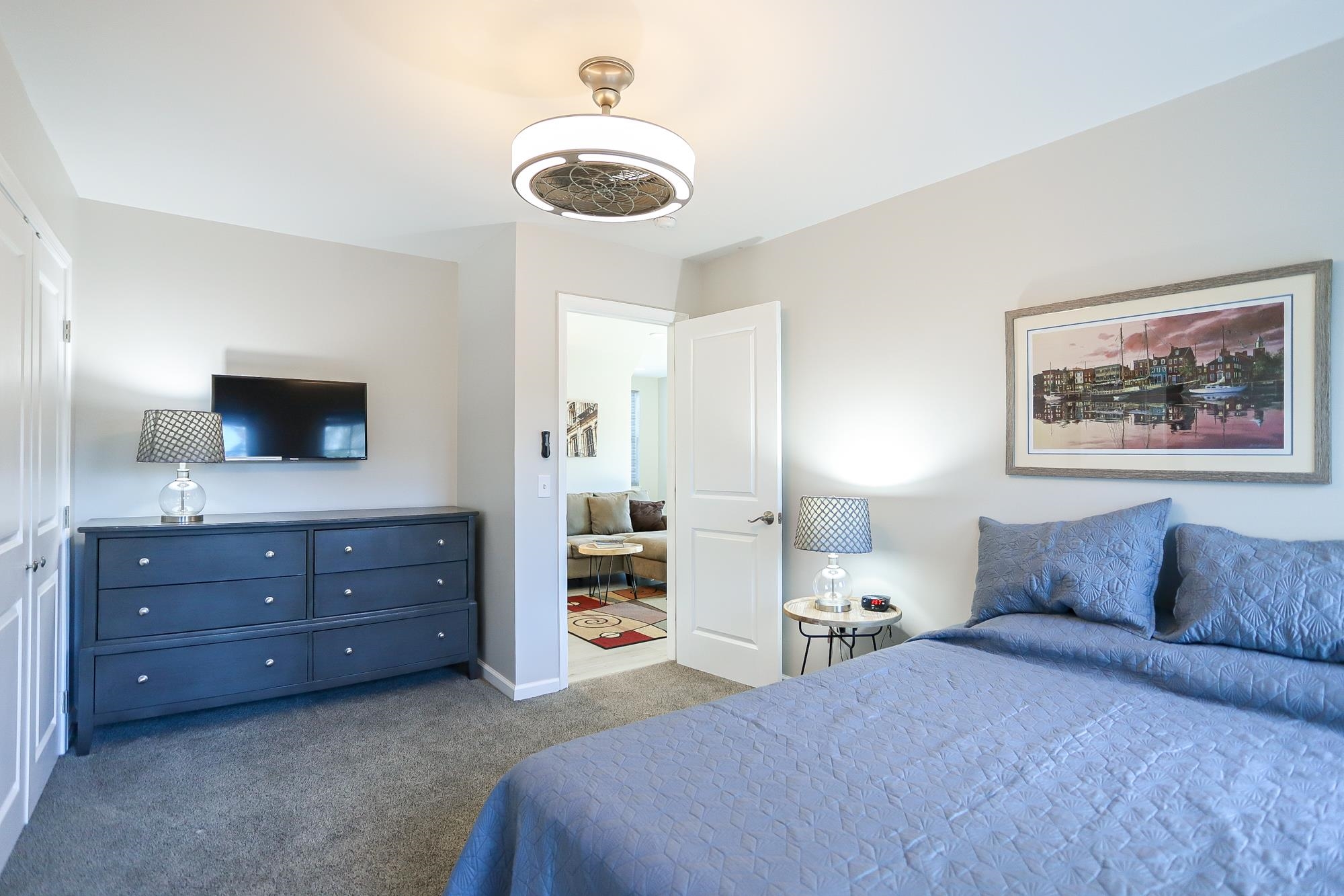 18 Cedarbrook Road Cape May, NJ 08204 - Photo 24 of 44 a bedroom with a bed and a television